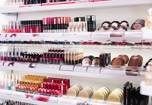 Variety of fashionable, diverse, colorful assortment of modern cosmetics store